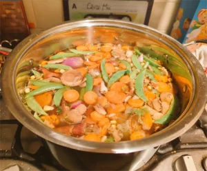 A cooking pot filled with stock